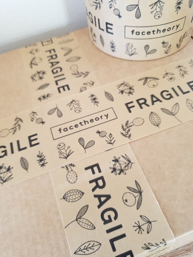 I'm Eco Friendly leaf-pattern tape on a white box